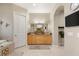 Bathroom features a double vanity, tub, tile flooring, and modern fixtures at 1383 Opal Valley St, Henderson, NV 89052