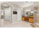 Spacious bathroom with double vanity, tiled floors, and a separate walk-in shower at 1383 Opal Valley St, Henderson, NV 89052