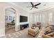 Versatile bonus room with gym equipment, comfortable seating, and ample natural light at 1383 Opal Valley St, Henderson, NV 89052