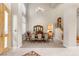 Formal dining room with elegant decor, a large window, and a chandelier for stylish meals at 1383 Opal Valley St, Henderson, NV 89052