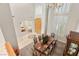 An expansive dining room showcasing the grand staircase and elegant chandelier at 1383 Opal Valley St, Henderson, NV 89052