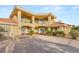 Impressive two-story home with balconies, outdoor seating, and a grand entrance at 1383 Opal Valley St, Henderson, NV 89052