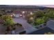Stunning two-story home with a red tile roof, lush landscaping, and a spacious driveway at 1383 Opal Valley St, Henderson, NV 89052