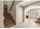 Inviting home entrance with stairs, tile floors, and great lighting at 1383 Opal Valley St, Henderson, NV 89052