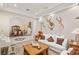 Cozy living room with comfortable seating, a decorative fireplace, and plenty of natural light at 1383 Opal Valley St, Henderson, NV 89052