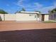 Gravel backyard with patio, artificial turf, and detached building at 1720 Eastwood Dr, Las Vegas, NV 89104