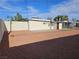 Backyard with gravel, patio, and artificial turf at 1720 Eastwood Dr, Las Vegas, NV 89104
