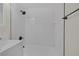 Remodeled bathroom features white subway tile and modern shower head at 1720 Eastwood Dr, Las Vegas, NV 89104