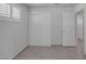 Bedroom featuring wood-look tile flooring and door to other rooms at 1720 Eastwood Dr, Las Vegas, NV 89104