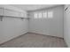 Bedroom featuring wood-look tile flooring and built in storage at 1720 Eastwood Dr, Las Vegas, NV 89104