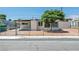 Charming single-story home with desert landscaping and chain-link fence at 1720 Eastwood Dr, Las Vegas, NV 89104