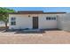 A clean exterior of a home with desert landscaping at 1720 Eastwood Dr, Las Vegas, NV 89104