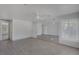 Bright, airy living room featuring wood-look floors and a mirrored wall at 1720 Eastwood Dr, Las Vegas, NV 89104