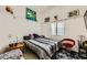 Bedroom with wall art and a ceiling fan at 1905 Dakota Hills Ave, Las Vegas, NV 89123