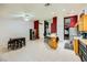 Large kitchen and dining area featuring tile floors and stainless steel appliances at 1905 Dakota Hills Ave, Las Vegas, NV 89123