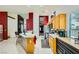 Bright kitchen features stainless steel appliances, tile flooring, and eat in breakfast area at 1905 Dakota Hills Ave, Las Vegas, NV 89123