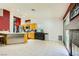 Bright kitchen features stainless steel appliances, tile flooring, and eat in breakfast area at 1905 Dakota Hills Ave, Las Vegas, NV 89123