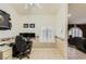 Office space with a desk and chair next to a window with bright natural light at 1905 Dakota Hills Ave, Las Vegas, NV 89123