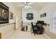 Office area featuring a fan, desk with monitors, and an office chair at 1905 Dakota Hills Ave, Las Vegas, NV 89123