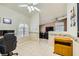Office space with a desk and chair next to a window with bright natural light at 1905 Dakota Hills Ave, Las Vegas, NV 89123