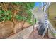 Cozy patio area with a pergola, landscaping, and hardscape at 1905 Dakota Hills Ave, Las Vegas, NV 89123