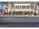Striking exterior of the Trump International building with palm trees and well-manicured landscaping at 2000 N Fashion Show Dr # 5326, Las Vegas, NV 89109