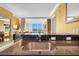Gourmet kitchen featuring granite countertops, stainless steel sink, and views of the living space at 2000 N Fashion Show Dr # 5326, Las Vegas, NV 89109