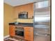 Contemporary kitchenette features stainless steel appliances and ample cabinet space at 2000 N Fashion Show Dr # 5326, Las Vegas, NV 89109
