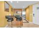 Well-equipped kitchenette features modern appliances and breakfast bar seating at 2000 N Fashion Show Dr # 5326, Las Vegas, NV 89109