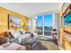 Bright living room showcases city views, stylish decor, and comfortable seating at 2000 N Fashion Show Dr # 5326, Las Vegas, NV 89109