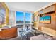Bright living room boasts city views, a TV, and modern furnishings at 2000 N Fashion Show Dr # 5326, Las Vegas, NV 89109