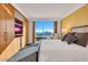 Serene bedroom with floor-to-ceiling windows offering stunning city views and plenty of natural light at 2000 N Fashion Show Dr # 5326, Las Vegas, NV 89109