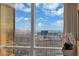 Stunning city view from the window of Treasure Island and the Las Vegas Strip with clear blue skies at 2000 N Fashion Show Dr # 5326, Las Vegas, NV 89109