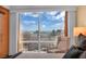 Relaxing bedroom setting with a stunning view of the Las Vegas Strip through a large picture window at 2000 N Fashion Show Dr # 5326, Las Vegas, NV 89109