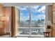 Striking view from a window overlooking the Las Vegas Strip with Treasure Island prominently featured at 2000 N Fashion Show Dr # 5326, Las Vegas, NV 89109