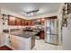 Well-equipped kitchen with stainless steel appliances, granite countertops, and ample cabinet space, ready for culinary adventures at 2028 Bavington Dr # A, Las Vegas, NV 89108