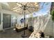 Serene patio featuring cozy seating, stylish umbrella, and peaceful decor for outdoor relaxation at 2028 Bavington Dr # A, Las Vegas, NV 89108