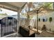 Cozy outdoor patio area with stylish furniture, decorative accents, and a peaceful setting at 2028 Bavington Dr # A, Las Vegas, NV 89108