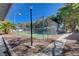 Outdoor tennis court enclosed with fencing at 2028 Bavington Dr # A, Las Vegas, NV 89108