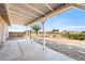 Covered back patio with concrete slab and supports, offering a relaxed outdoor living space at 2440 Homestead Rd, Pahrump, NV 89048
