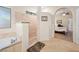 Open bathroom design with separate shower and tub, with views into the bedroom at 2505 Links Dr, Laughlin, NV 89029