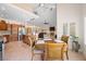 Spacious dining area is adjacent to kitchen and Gathering room with large windows providing lots of natural light at 2505 Links Dr, Laughlin, NV 89029