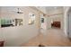Open concept foyer with views of living spaces, including a dining area and main bedroom at 2505 Links Dr, Laughlin, NV 89029