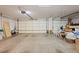 Spacious three car garage with ample storage and overhead lighting at 2505 Links Dr, Laughlin, NV 89029