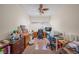 Bright home office with ceiling fan, storage and natural light at 2505 Links Dr, Laughlin, NV 89029