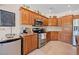 Bright kitchen featuring stainless steel appliances, wood cabinets and light countertops at 2505 Links Dr, Laughlin, NV 89029