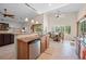 Bright kitchen features granite countertops, stainless dishwasher, and dining nook at 2505 Links Dr, Laughlin, NV 89029
