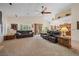 Large living room with access to the backyard and open views into other living spaces at 2505 Links Dr, Laughlin, NV 89029