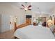 Spacious main bedroom with sitting area and glass sliding doors leading to the backyard at 2505 Links Dr, Laughlin, NV 89029