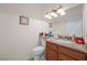 Granite-topped vanity and sink in bright powder room at 2505 Links Dr, Laughlin, NV 89029